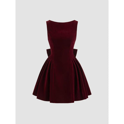 Turn heads in our Cider Velvet Boat Neck Bow Backless Mini Dress! 🍂✨ #FashionGoals #OOTD
