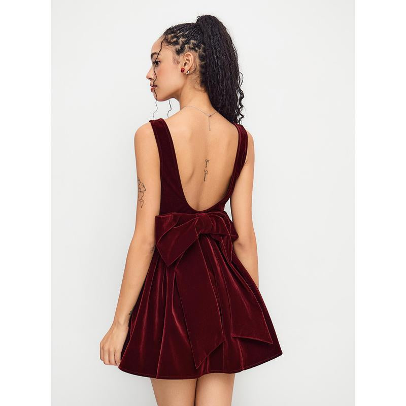 Turn heads in our Cider Velvet Boat Neck Bow Backless Mini Dress! 🍂✨ #FashionGoals #OOTD