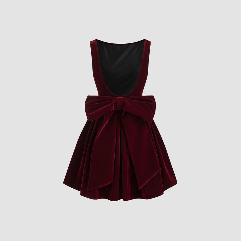 Turn heads in our Cider Velvet Boat Neck Bow Backless Mini Dress! 🍂✨ #FashionGoals #OOTD