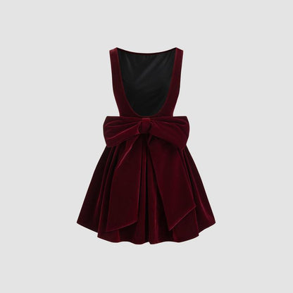 Turn heads in our Cider Velvet Boat Neck Bow Backless Mini Dress! 🍂✨ #FashionGoals #OOTD